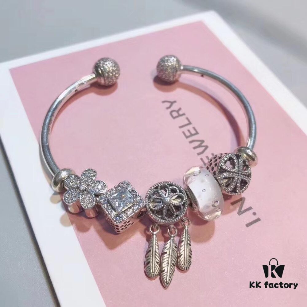 692fe3f299f2d84055c8bf78 Pandora White Bubble Dreamcatcher Pendant with Sparkling Rhinestones, Daisy Flower, Hollow Four-Leaf Clover, and Cat's Eye Cubic Zirconia