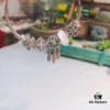 692fe3f599f2d84055c8bf7d Pandora White Bubble Dreamcatcher Pendant with Sparkling Rhinestones, Daisy Flower, Hollow Four-Leaf Clover, and Cat's Eye Cubic Zirconia