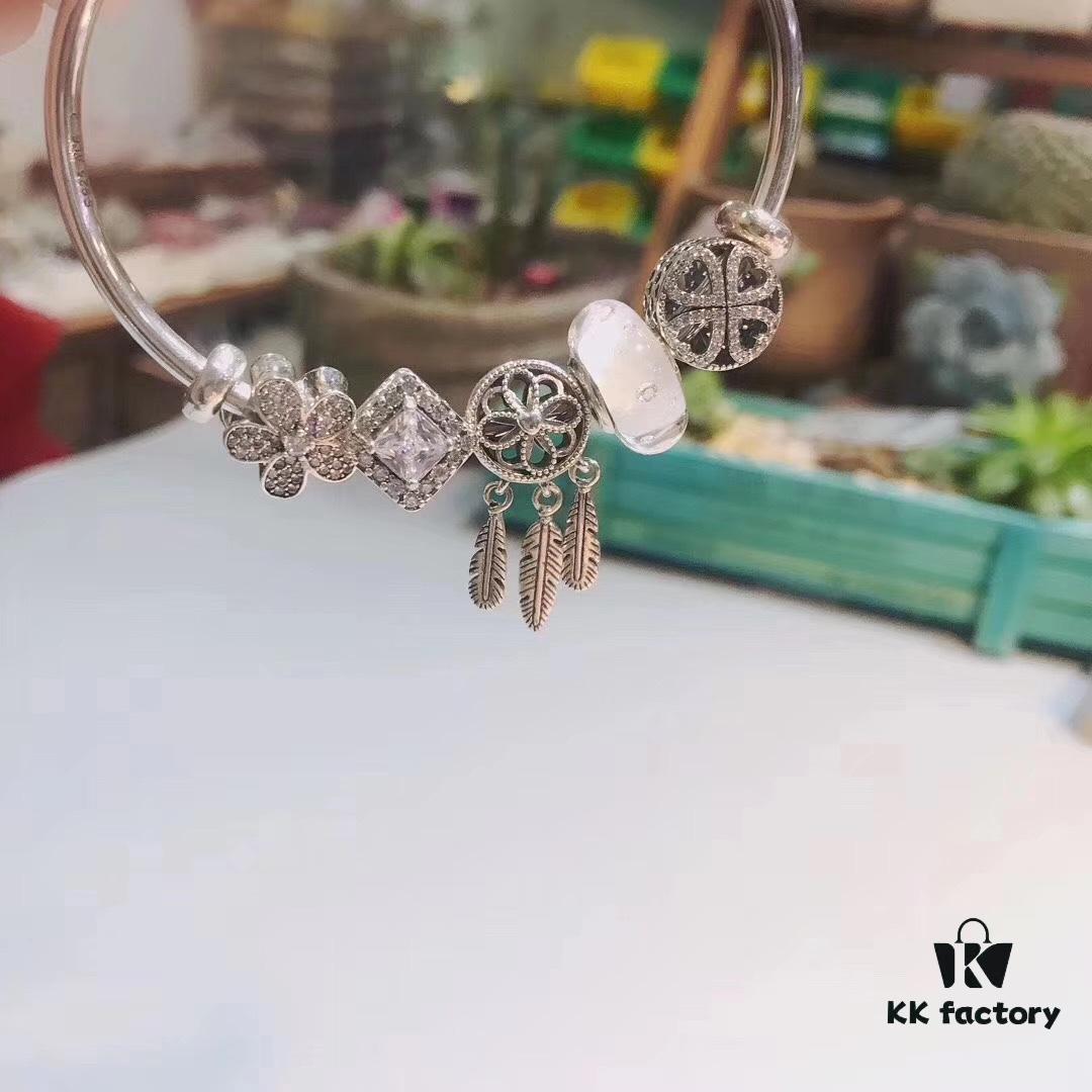 692fe3f599f2d84055c8bf7d Pandora White Bubble Dreamcatcher Pendant with Sparkling Rhinestones, Daisy Flower, Hollow Four-Leaf Clover, and Cat's Eye Cubic Zirconia