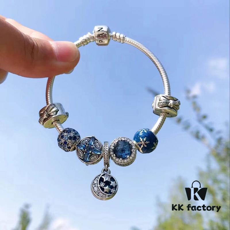 692fe42499f2d84055c8bfdc Pandora Pandora Shimmering Blue Star and Moon ☪️ New Arrival! Perfectly crafted with counter materials, one-to-one replication, quality comparable to official store products! Shimmering blue cross snowflake ❄️ charm, sparkling dark blue cat's eye, fully diamond-paved blue bead, enamel snowflake bead, bow 🎀 clasp, paired with star and moon fairy tale pendant. Made of S925 silver and comes with official packaging!