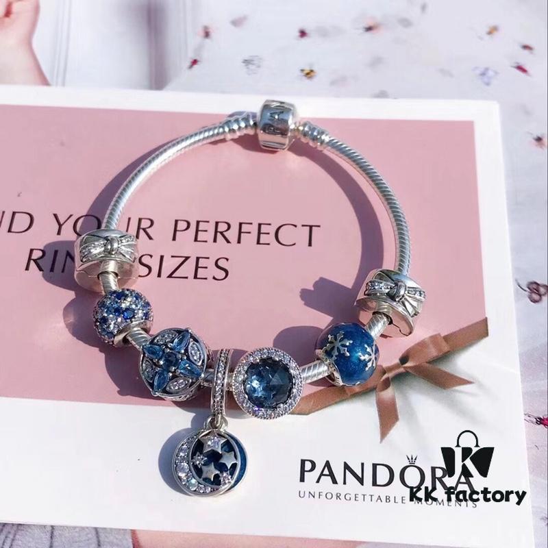 692fe42599f2d84055c8bfde Pandora Pandora Shimmering Blue Star and Moon ☪️ New Arrival! Perfectly crafted with counter materials, one-to-one replication, quality comparable to official store products! Shimmering blue cross snowflake ❄️ charm, sparkling dark blue cat's eye, fully diamond-paved blue bead, enamel snowflake bead, bow 🎀 clasp, paired with star and moon fairy tale pendant. Made of S925 silver and comes with official packaging!