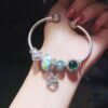 692fe42b99f2d84055c8bfea Pandora Rainbow Love New Arrival! High-Quality Replica with Original Materials, Featuring Colorful Glass Beads, Sparkling Green Charms, Square Cat's Eye, and Diamond-Cut Green Cat's Eye Pendant Symbolizing Beautiful Love