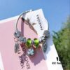 692fe49599f2d84055c8c0d6 Pandora Pandora Olive Green Clover New Arrival! Made with counter material, one-to-one perfect craftsmanship, quality comparable to counter! Olive green faceted glass, fully diamond-paved five-petal flower bead, purple bow heart, feather wing pendant, sparkling diamond white cat's eye, clear snowflake bead, paired with sparkling diamond clover pendant. S925 silver comes with official counter packaging!