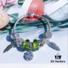 692fe49699f2d84055c8c0d8 Pandora Pandora Olive Green Clover New Arrival! Made with counter material, one-to-one perfect craftsmanship, quality comparable to counter! Olive green faceted glass, fully diamond-paved five-petal flower bead, purple bow heart, feather wing pendant, sparkling diamond white cat's eye, clear snowflake bead, paired with sparkling diamond clover pendant. S925 silver comes with official counter packaging!