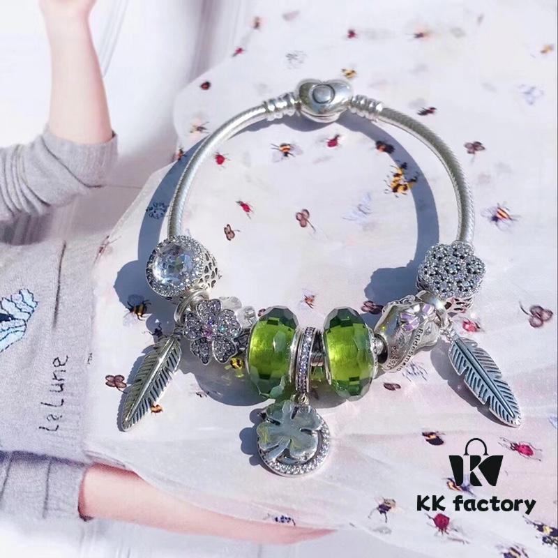 692fe49899f2d84055c8c0db Pandora Pandora Olive Green Clover New Arrival! Made with counter material, one-to-one perfect craftsmanship, quality comparable to counter! Olive green faceted glass, fully diamond-paved five-petal flower bead, purple bow heart, feather wing pendant, sparkling diamond white cat's eye, clear snowflake bead, paired with sparkling diamond clover pendant. S925 silver comes with official counter packaging!