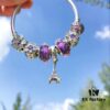 692fe49899f2d84055c8c0dd Pandora Romantic Purple Eiffel Tower Tower 🗼 New Arrival! Made with counter-grade materials, perfectly crafted at a 1:1 ratio, quality comparable to official store products! Features purple faceted glass beads, purple sparkling forget-me-not stones, fully diamond-paved five-petal flower beads, rose-purple sparkling diamond beads, paired with the iconic Eiffel Tower 🗼 pendant. Comes with S925 silver and original boutique packaging!