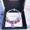 692fe4ba99f2d84055c8c123 Pandora Enamel Clover Passionate Rose Red New Arrival! High-Quality Replica with Original Materials, Full Diamond-Paved Hollow Clover Pendant with Rose Red Heart Faceted Glass and Sparkling Cat's Eye, Double-Layer Clover Charm with S925 Silver and Authentic Packaging