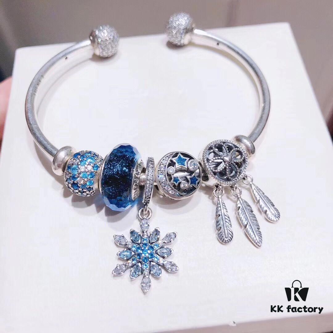 692fe4ce99f2d84055c8c157 Pandora Pandora Shimmering Blue Snowflake ❄️ New Arrival! Perfectly crafted with counter materials, one-to-one replication, quality comparable to official store products! Featuring faceted shimmering blue glass, sparkling diamond-cut beads, openwork star and moon design, symbolic dream-catcher pendant, blue snowflake ❄️ charm. Comes with original counter packaging!