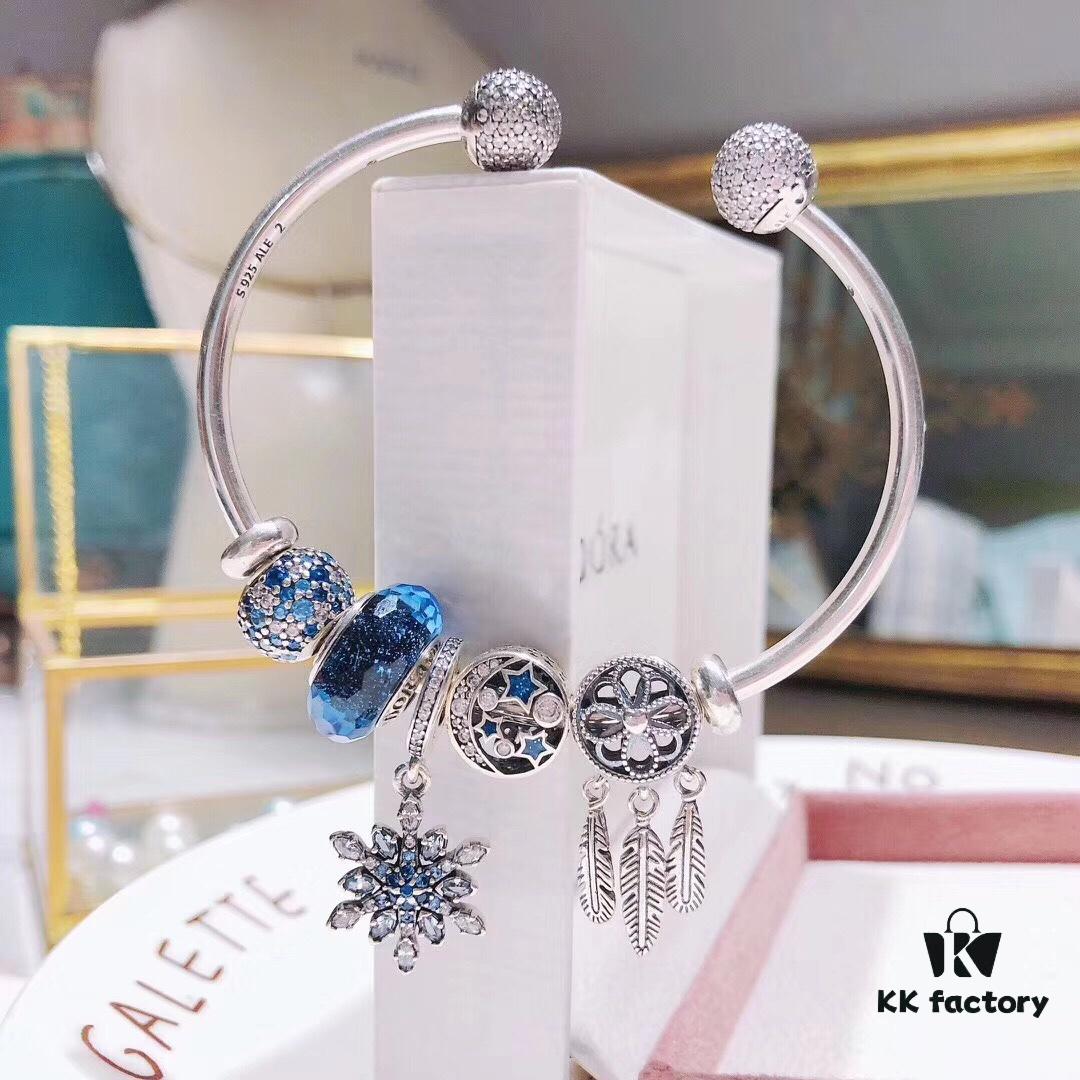 692fe4d099f2d84055c8c15b Pandora Pandora Shimmering Blue Snowflake ❄️ New Arrival! Perfectly crafted with counter materials, one-to-one replication, quality comparable to official store products! Featuring faceted shimmering blue glass, sparkling diamond-cut beads, openwork star and moon design, symbolic dream-catcher pendant, blue snowflake ❄️ charm. Comes with original counter packaging!