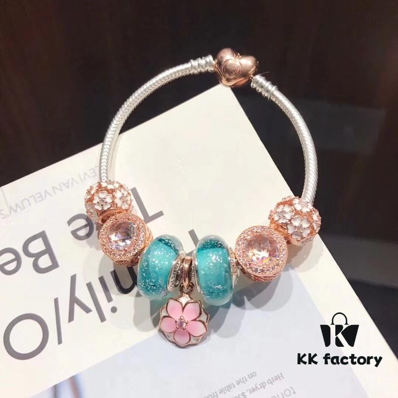692fe4d399f2d84055c8c15f Pandora Night Glow Mint Rose Peach Blossom New Arrival! Crafted with authentic boutique materials, perfectly replicating the original quality. Features night glow mint glass beads, rose-shaped sparkling crystal white cat's eye bead, rose daisy charm, paired with a rose peach blossom pendant. Made in S925 silver and comes with official boutique packaging!