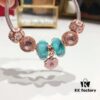 692fe4d799f2d84055c8c169 Pandora Night Glow Mint Rose Peach Blossom New Arrival! Crafted with authentic boutique materials, perfectly replicating the original quality. Features night glow mint glass beads, rose-shaped sparkling crystal white cat's eye bead, rose daisy charm, paired with a rose peach blossom pendant. Made in S925 silver and comes with official boutique packaging!