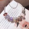 692fe51d99f2d84055c8c1e6 Pandora Pink and Purple Two-Tone Angel Wings New Arrival! Crafted with authentic boutique materials, perfectly replicated to match retail quality. Features pink heart glass beads, purple and brown two-tone glass beads, pumpkin carriage charm, pink heart charm, openwork heart charm, purple five-petal flower charm, and angel wings pendant.