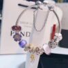 692fe51d99f2d84055c8c1e7 Pandora Pink and Purple Two-Tone Angel Wings New Arrival! Crafted with authentic boutique materials, perfectly replicated to match retail quality. Features pink heart glass beads, purple and brown two-tone glass beads, pumpkin carriage charm, pink heart charm, openwork heart charm, purple five-petal flower charm, and angel wings pendant.