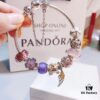 692fe51e99f2d84055c8c1e9 Pandora Pink and Purple Two-Tone Angel Wings New Arrival! Crafted with authentic boutique materials, perfectly replicated to match retail quality. Features pink heart glass beads, purple and brown two-tone glass beads, pumpkin carriage charm, pink heart charm, openwork heart charm, purple five-petal flower charm, and angel wings pendant.
