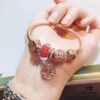 692fe57e99f2d84055c8c29c Pandora Thailand Imported Genuine Red Rose Olive Tree Pendant - ZP Material, Gold-Plated Murano Glass with Hollow Heart Design