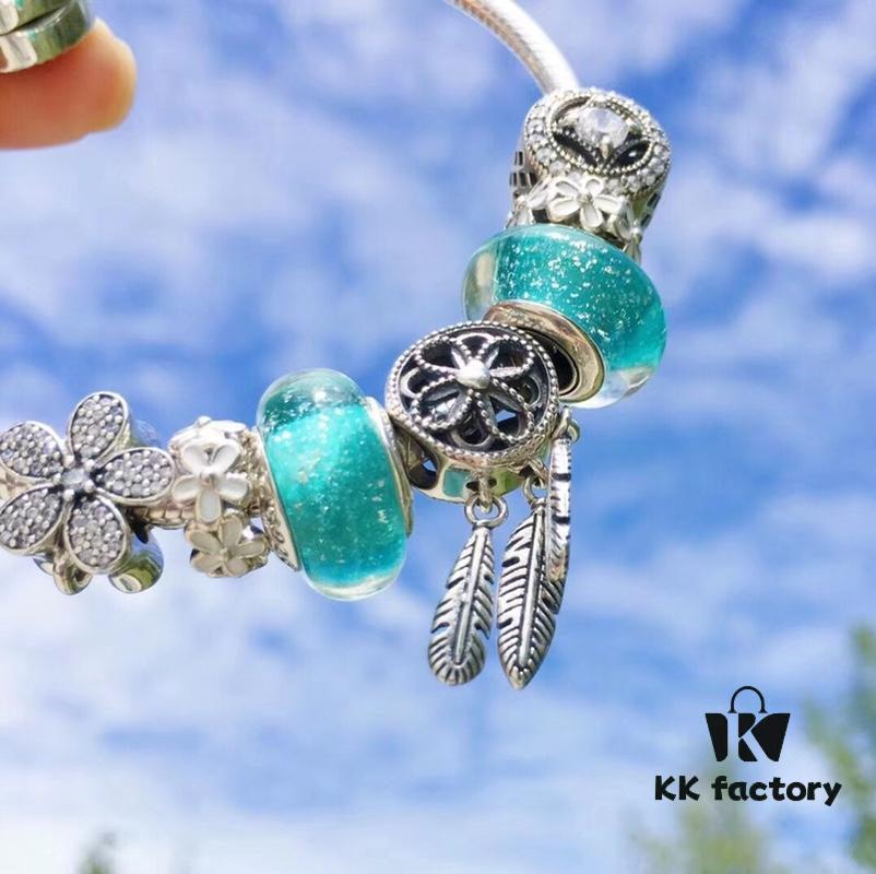 692fe61099f2d84055c8c38a Pandora Night Glow Mint Dreamcatcher New Arrival! Crafted with genuine counter materials, perfectly replicating the original design, quality comparable to official retail. Features night-glow mint glass beads, fully diamond-encrusted daisy flower beads, lucky coin beads, enamel daisy spacer beads, accented with a meaningful dreamcatcher pendant. Made in S925 silver and comes with official retail packaging!