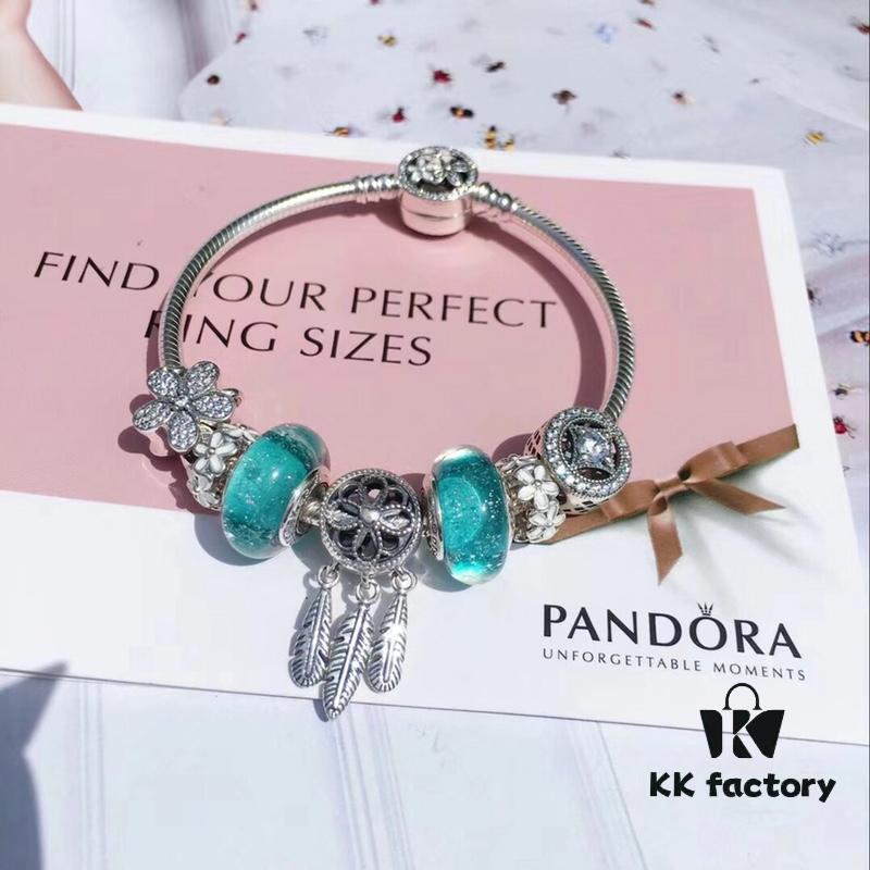 692fe61299f2d84055c8c38c Pandora Night Glow Mint Dreamcatcher New Arrival! Crafted with genuine counter materials, perfectly replicating the original design, quality comparable to official retail. Features night-glow mint glass beads, fully diamond-encrusted daisy flower beads, lucky coin beads, enamel daisy spacer beads, accented with a meaningful dreamcatcher pendant. Made in S925 silver and comes with official retail packaging!