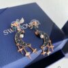 692fe65099f2d84055c8c404 Swarovski New Arrival Earrings - Blue Moon with Star and Pearl Accents