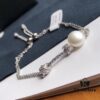 692fe65399f2d84055c8c40b APM Monaco HERITAGE Collection Knot Freshwater Pearl Bracelet