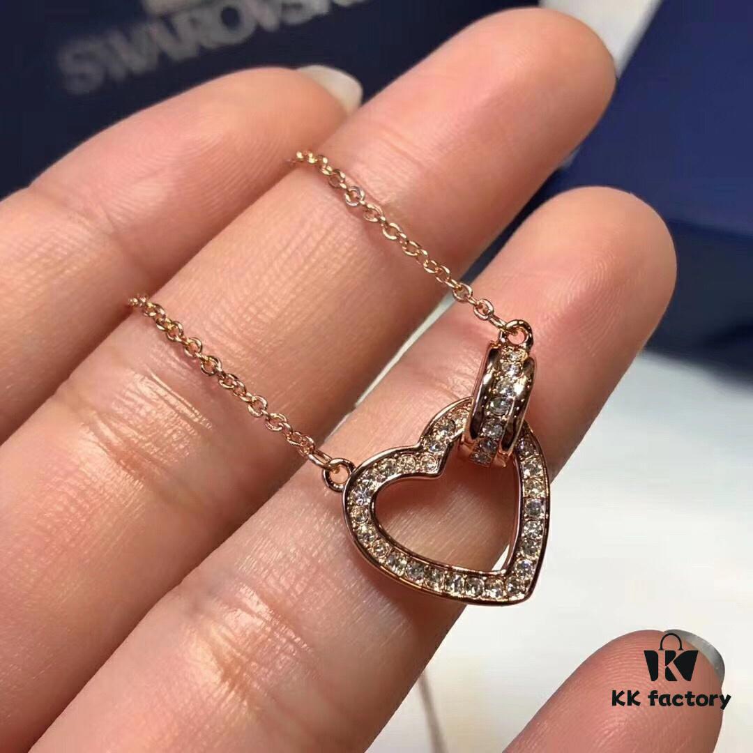 692fe66699f2d84055c8c436 Swarovski 2018 Lovely Romantic Heart Necklace for Women, Gift for Girlfriend, Elegant and Fresh Design with Knot-Shaped Heart Symbolizing a Unique Bond, Sparkling Golden-Tone Plating with Transparent Pavé Crystals, Perfect for Daily Wear and an Ideal Gift of Love
