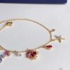 692fe68899f2d84055c8c479 Swarovski OCEAN Marine Life Bicolor Colorful Bracelet for Women, Golden Chain with Gradient Seahorse, Crab Charm and Starfish Detail, Adjustable Fit, Perfect Gift for Her