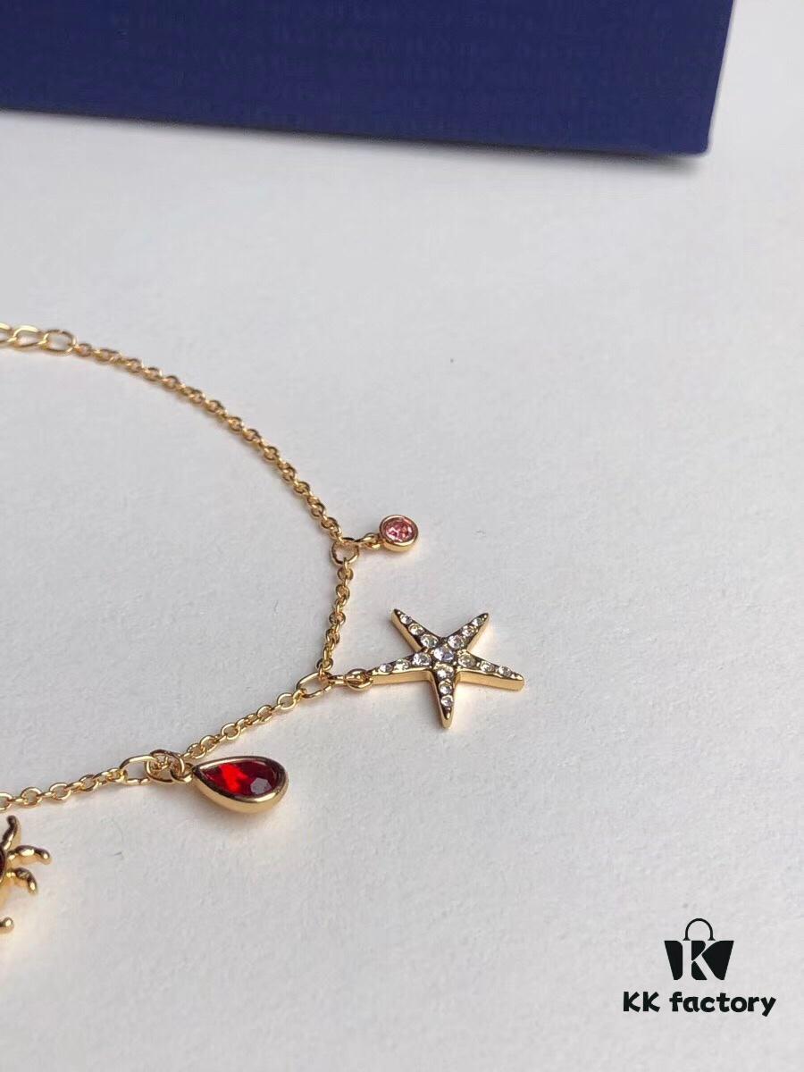 692fe68899f2d84055c8c47b Swarovski OCEAN Marine Life Bicolor Colorful Bracelet for Women, Golden Chain with Gradient Seahorse, Crab Charm and Starfish Detail, Adjustable Fit, Perfect Gift for Her