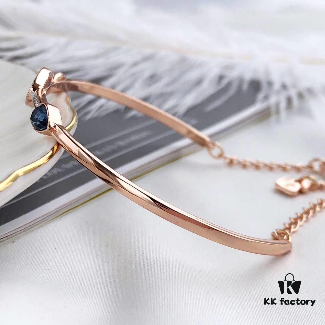 692fe6b499f2d84055c8c4be Swarovski Demon Bracelet, Classic Best-Selling Design with Black, Blue, and White Crystals Encircling Gracefully, Evoking the Mystical Potion of the Demon's Eye That Opens the Door to Luck and Lifelong Blessings! Elegant 18K Rose Gold-Plated Alloy with Vacuum Plating Paired with Black, Blue, and White Swarovski Crystals. One Size Fits All with Full Original Retail Packaging!