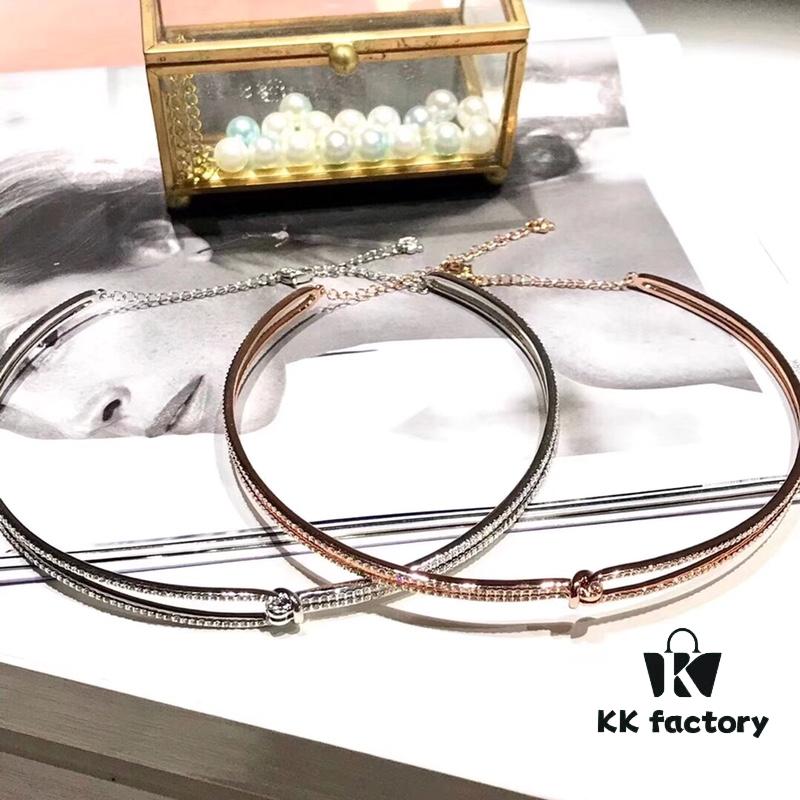 692fe71699f2d84055c8c580 Swarovski Twisted Knot Choker Necklace – New Arrival 'Love Knot' Design with Sparkling Crystals, Imported Gold-Plated Material, Authentic Logo, Two Colors Available