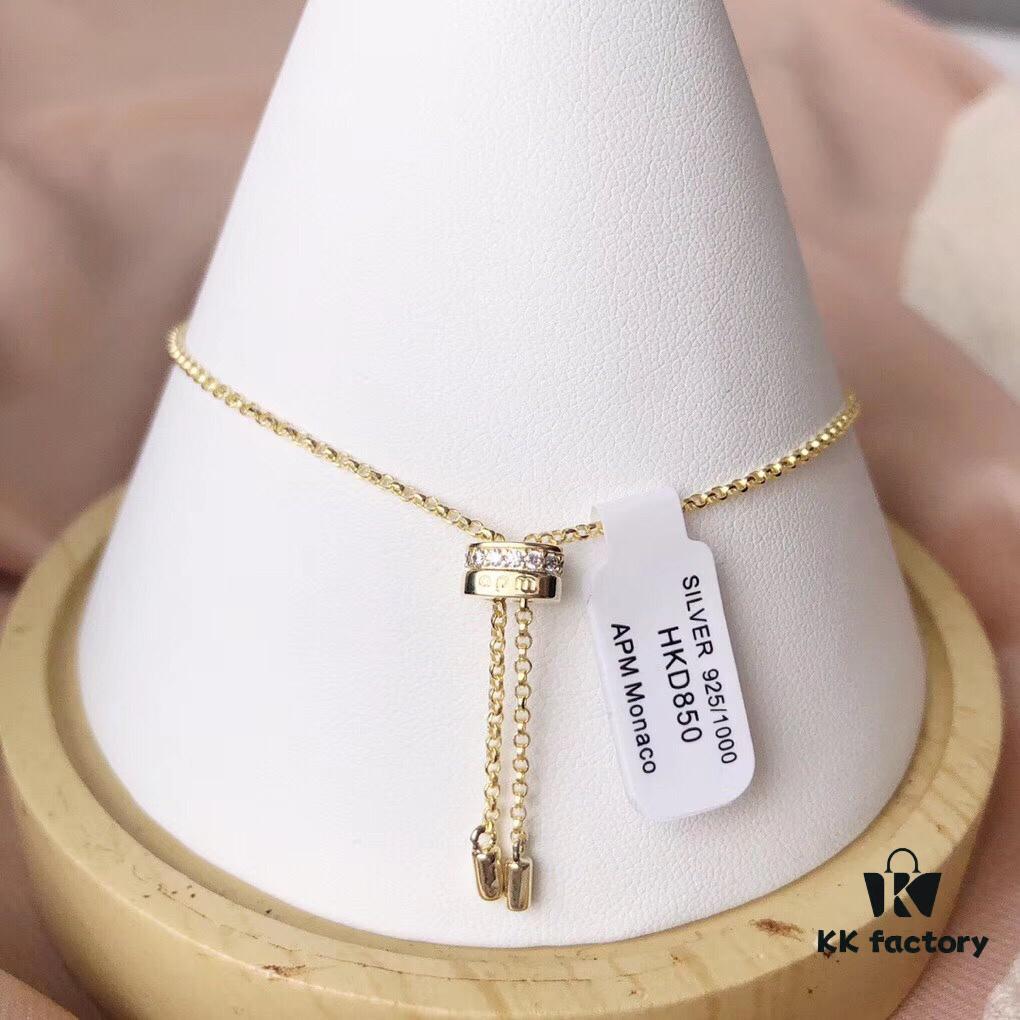 692fe7a899f2d84055c8c664 APM Monaco Silver-Plated Gold-Tone Necklace with Crystal Pendant for Women, Elegant Circular Locket Chain