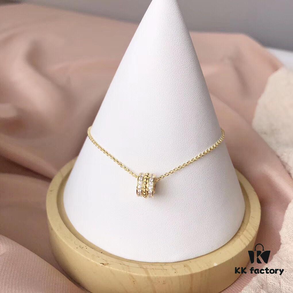 692fe7ae99f2d84055c8c66a APM Monaco Silver-Plated Gold-Tone Necklace with Crystal Pendant for Women, Elegant Circular Locket Chain