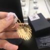 692fe7bd99f2d84055c8c686 APM Golden Lion Asymmetrical Pendant Earrings