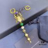 692fe7cf99f2d84055c8c6a4 APM Asymmetrical Scarab Drop Earrings