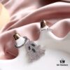 692fe7d299f2d84055c8c6a8 APM Monaco Asymmetrical S925 Sterling Silver Ghost-Shaped Earrings with Green Crystals