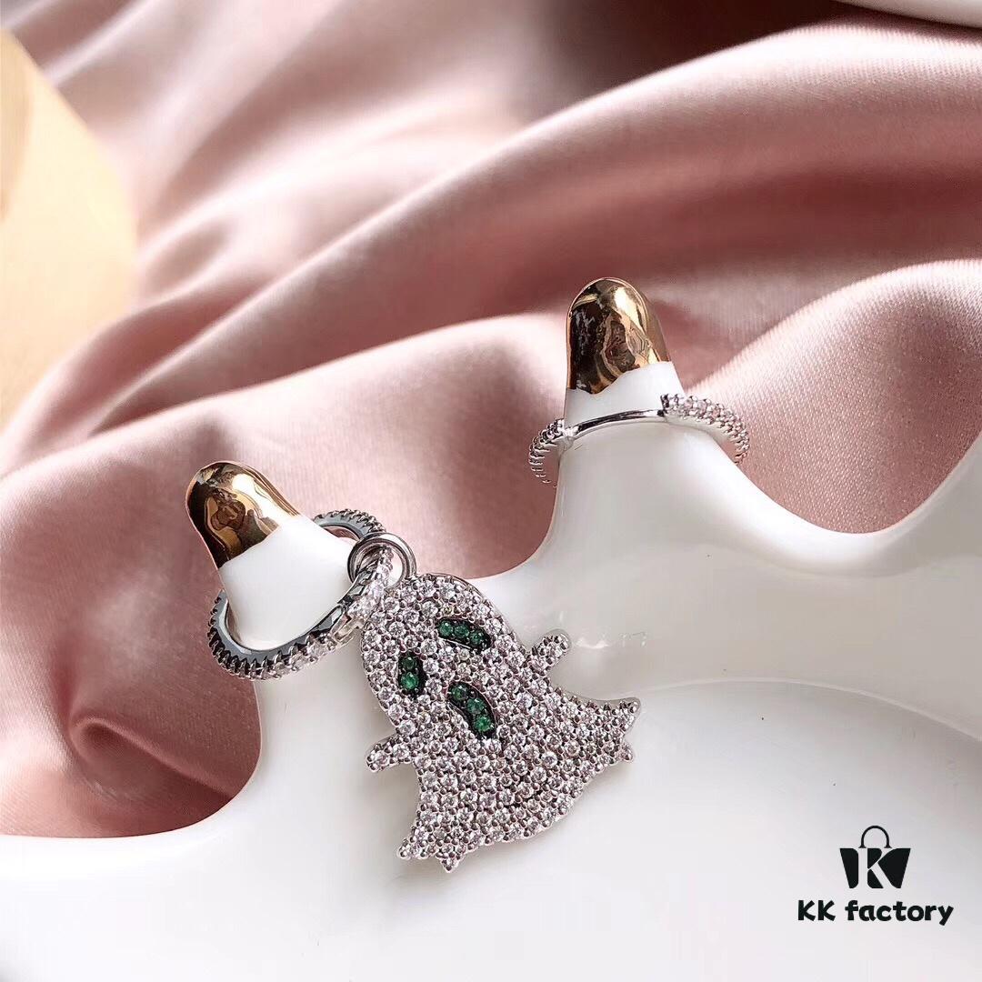 692fe7d299f2d84055c8c6a8 APM Monaco Asymmetrical S925 Sterling Silver Ghost-Shaped Earrings with Green Crystals