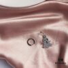 692fe7d399f2d84055c8c6a9 APM Monaco Asymmetrical S925 Sterling Silver Ghost-Shaped Earrings with Green Crystals