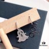 692fe7d399f2d84055c8c6aa APM Monaco Asymmetrical S925 Sterling Silver Ghost-Shaped Earrings with Green Crystals