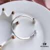 692fe7df99f2d84055c8c6bc APM Monaco Sterling Silver Crystal Diamond Mother-of-Pearl Pearl Open Bangle Simple and Elegant Fashion Piece