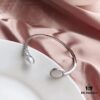 692fe7df99f2d84055c8c6bd APM Monaco Sterling Silver Crystal Diamond Mother-of-Pearl Pearl Open Bangle Simple and Elegant Fashion Piece