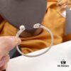 692fe9bf99f2d84055c8c9f8 APM Monaco Mother-of-Pearl Freshwater Pearl Open Cuff Bracelet for Women, Vintage Jewelry, Ideal for Couples, Gala Events and Year-End Parties