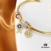 692fe9c299f2d84055c8c9fc APM Monaco Lucky Little Fish Bracelet with Sliding Ring in Gold-Tone, Stylish and Unique Open Cuff Bangle Jewelry in Silver