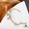 692fe9c399f2d84055c8c9fd APM Monaco Lucky Little Fish Bracelet with Sliding Ring in Gold-Tone, Stylish and Unique Open Cuff Bangle Jewelry in Silver