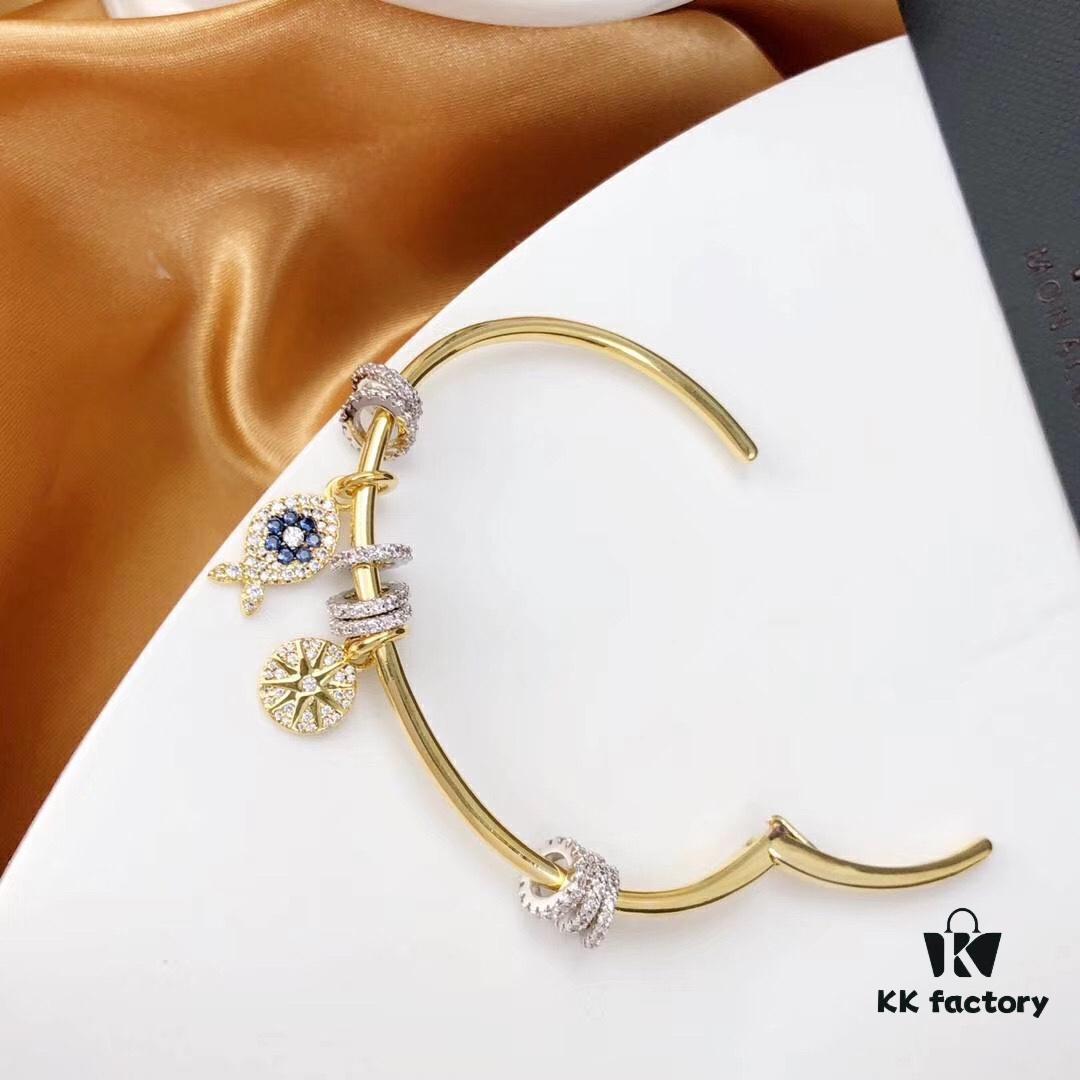 692fe9c399f2d84055c8c9fd APM Monaco Lucky Little Fish Bracelet with Sliding Ring in Gold-Tone, Stylish and Unique Open Cuff Bangle Jewelry in Silver