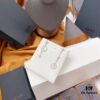 692fea2099f2d84055c8ca8e APM Monaco Mother-of-Pearl and Pearl Drop Earrings for Women, Asymmetric Luxury Jewelry, Elegant Long Dangle Earrings for Fall/Winter Events