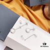 692fea2a99f2d84055c8ca9d APM Monaco Mother-of-Pearl and Pearl Drop Earrings for Women, Asymmetric Luxury Jewelry, Elegant Long Dangle Earrings for Fall/Winter Events