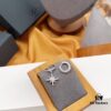 692fea3999f2d84055c8cab6 APM Monaco Asymmetrical Meteor Stud Earrings, Design-Centric Hoop Earrings, Minimalist and Elegant Ear Jewelry