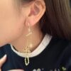 Authentic New Arrival💗 A Brand Monaco Cloud Cross Asymmetric Earrings, Stylish Minimalist and Versatile Design. 8365095