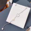 692fea4f99f2d84055c8cae1 APM Monaco Mother-of-Pearl Freshwater Pearl Earrings for Women, Long Asymmetrical Tassel Drop Earrings, Elegant Silver Jewelry