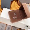 692fea5299f2d84055c8caea APM Monaco Asymmetrical Meteor Stud Earrings, Design-Centric Hoop Earrings, Minimalist and Elegant Ear Jewelry