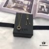 692feabb99f2d84055c8cb94 APM Monaco Sliding Hoop Necklace and Stud Earrings