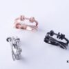 692feaf899f2d84055c8cbf2 APM Rotating Ring 💍 The small rotating circle on the ring is a signature element widely used by the brand, symbolizing bringing in good luck and spinning away bad fortune, hence it's also known as the 'Fortune Rotation Ring'. 06588075